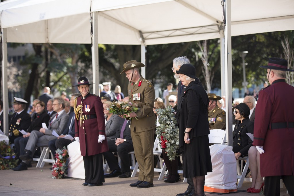 Brigadier Phil Moses, Commander 8th Brigade of The Australian Army on behalf of the 8th Brigade Mr Jim Munro, President of the Families and Friends of the First AIF, accompanied by Mrs Margaret Snodgrass OAM, in tribute to the Fallen, together with Ms Julie Werner, Mr Rene Herbert and Ms Helen Carey, in memory of the Missing
